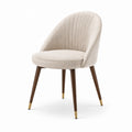 Chaise en tissu bouclé beige avec pieds en bois et laiton