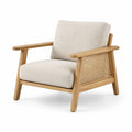Fauteuil en bois avec dossier cannage et coussins en tissu